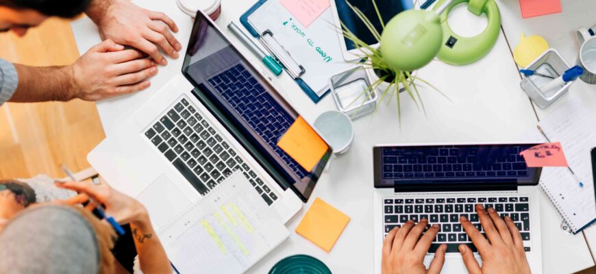 development team cooperating in their office 543833982 5919f0f33df78cf5fa8834b5