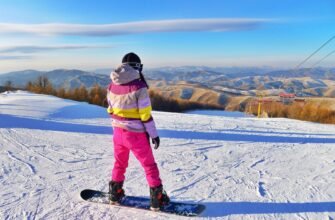 person snowboarding on field