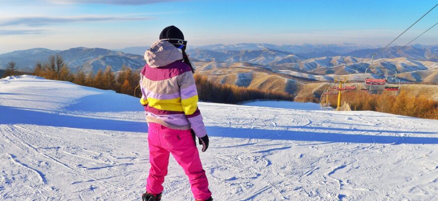 person snowboarding on field