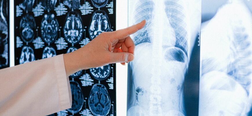 person holding white printer paper