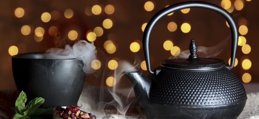 close up of black teapot