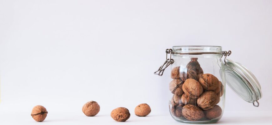 walnut in clear glass jar
