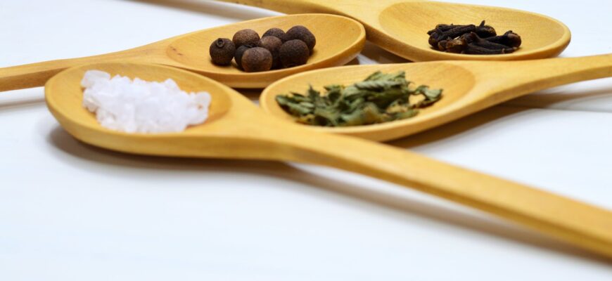 four brown wooden ladle