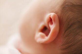 macro photography of babys ear