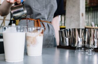white plastic cup with brown liquid