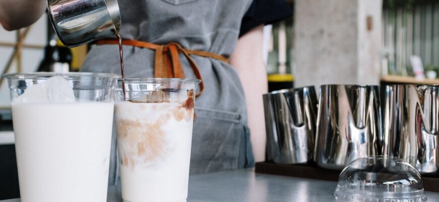 white plastic cup with brown liquid