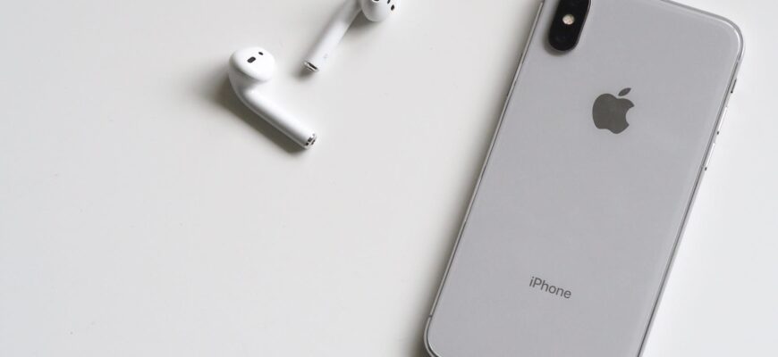 silver iphone x with airpods