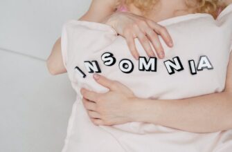 woman hugging a pillow