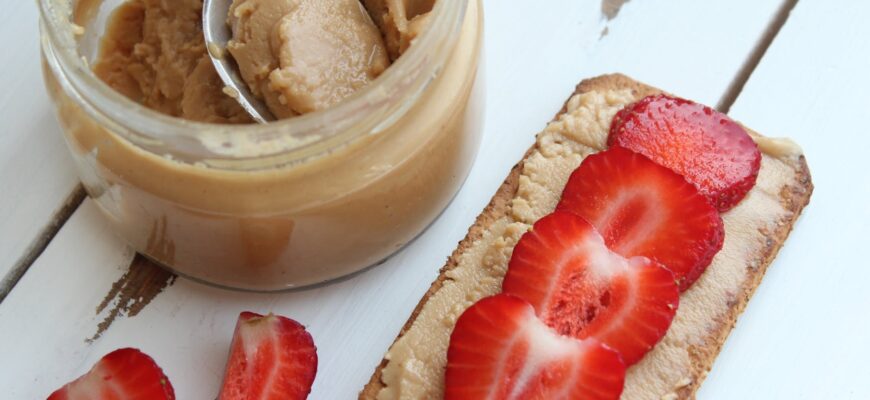 close up photo of slice strawberries on toast