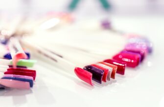 selective focus photography of assorted polished artificial nails