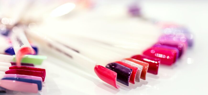 selective focus photography of assorted polished artificial nails