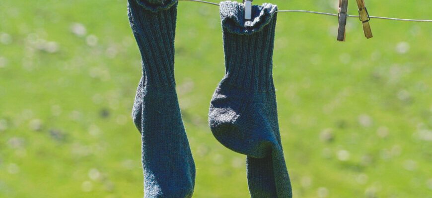 pair of blue socks hanging
