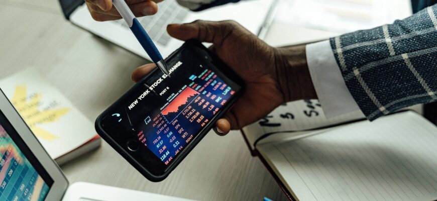 person holding black android smartphone