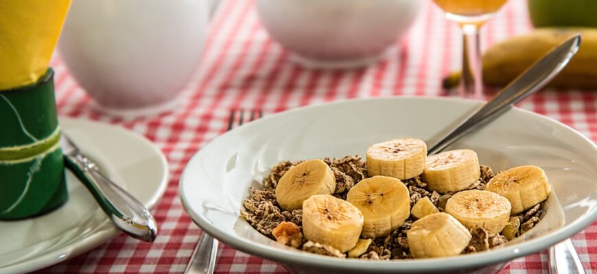 banana slices on white round ceramic plate on table