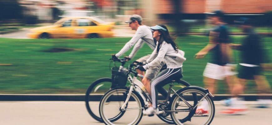 woman and man riding on bike