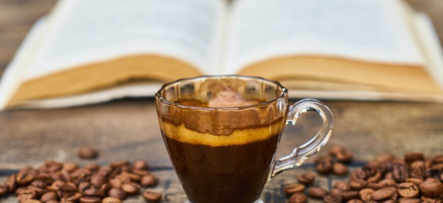clear glass teacup with coffee beverage