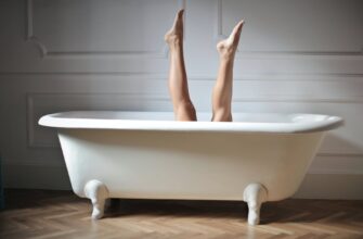 photo of female legs in bathtub