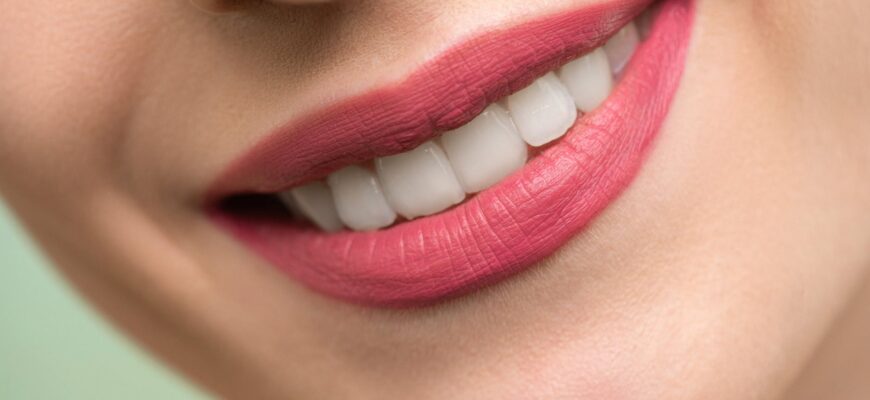 woman with red lipstick smiling