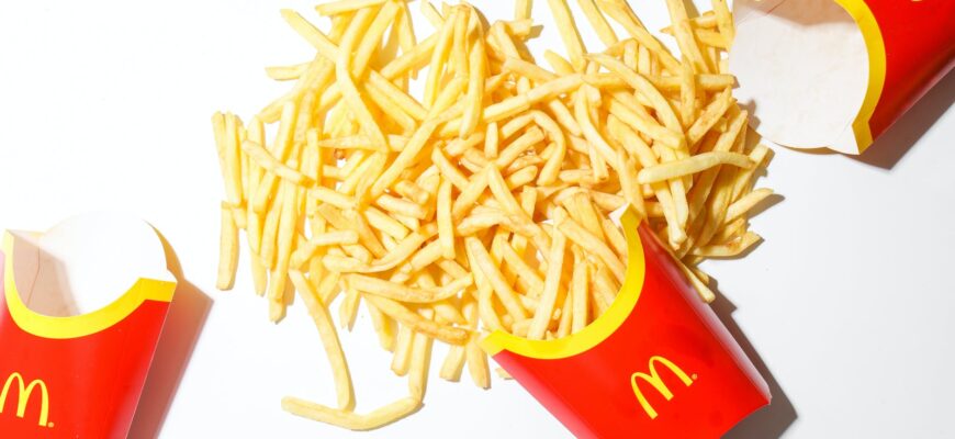 mcdonalds fries on white table