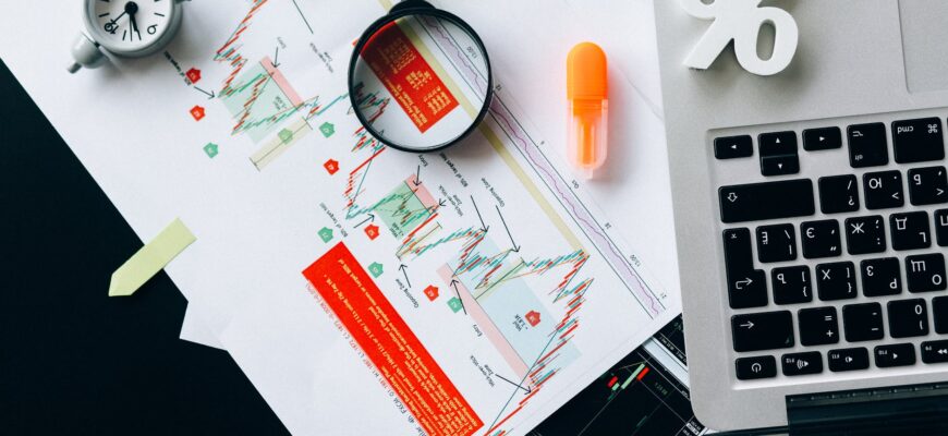 orange and white plastic container on white printer paper