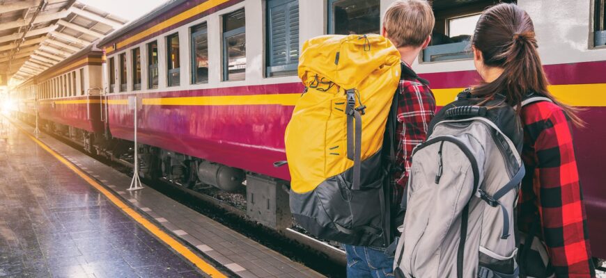 woman and man waiting on train station