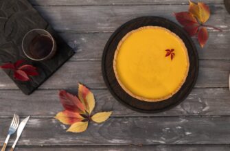 a close up shot of a pumpkin pie