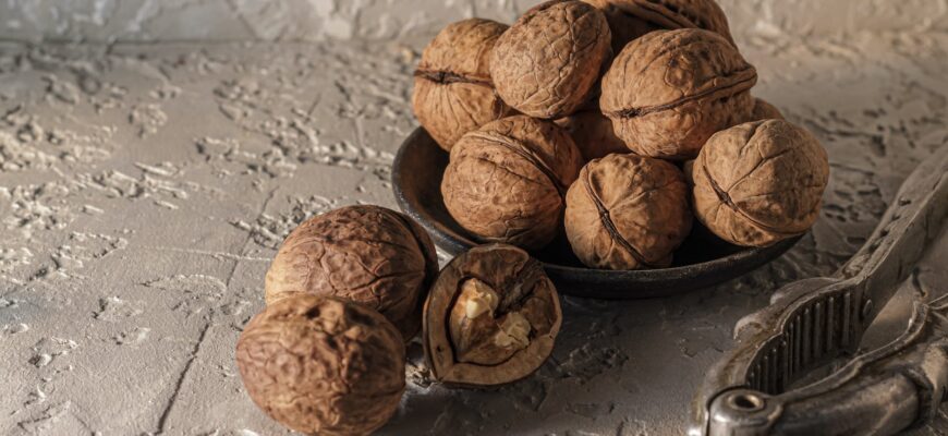 walnuts near walnut cracker