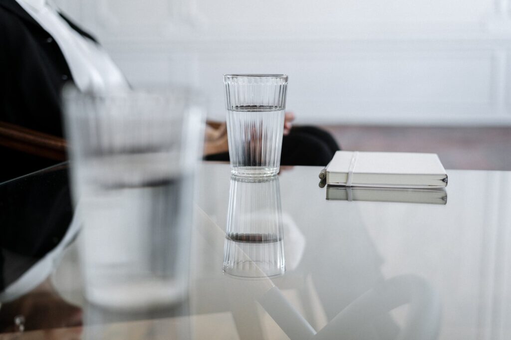 clear drinking glass on table