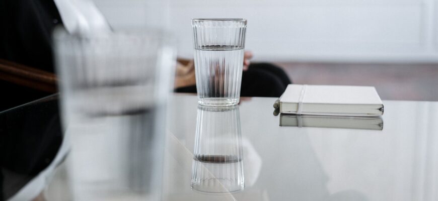 clear drinking glass on table