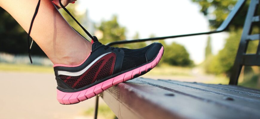 person foot on bench