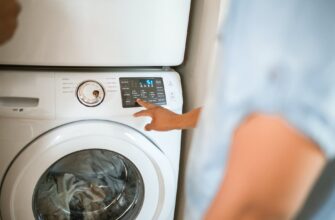 person using washing machine