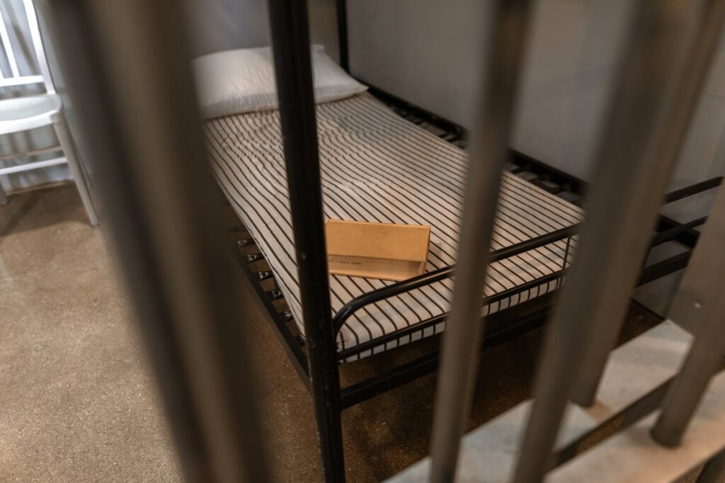 brown wooden box on a striped foam mattress