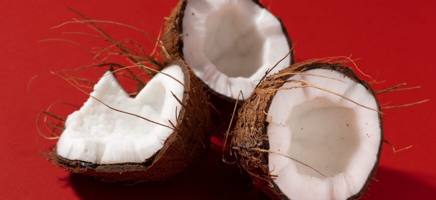 a close up shot of opened coconuts