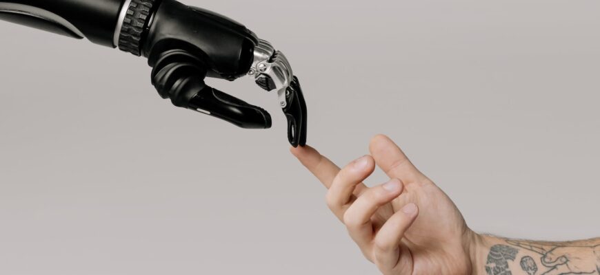 bionic hand and human hand finger pointing