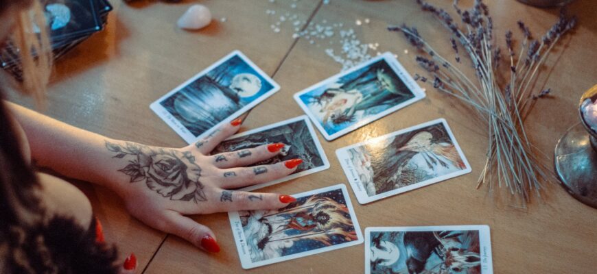 assorted tarot cards on table