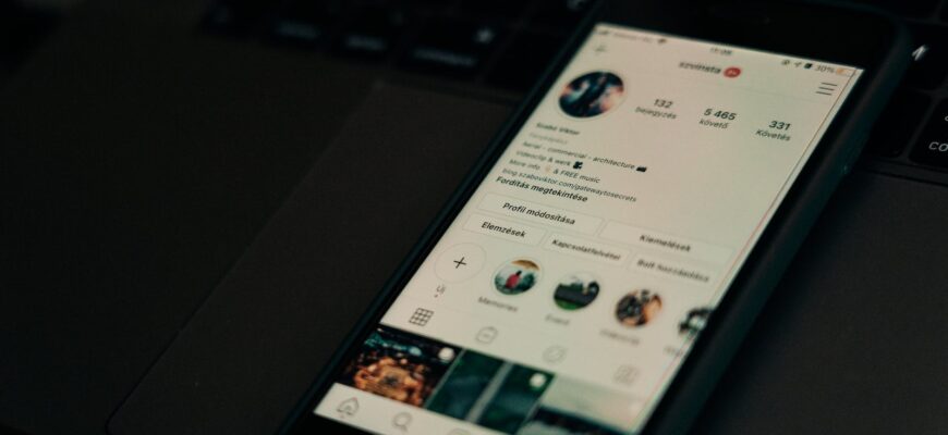 smartphone on top of a laptop