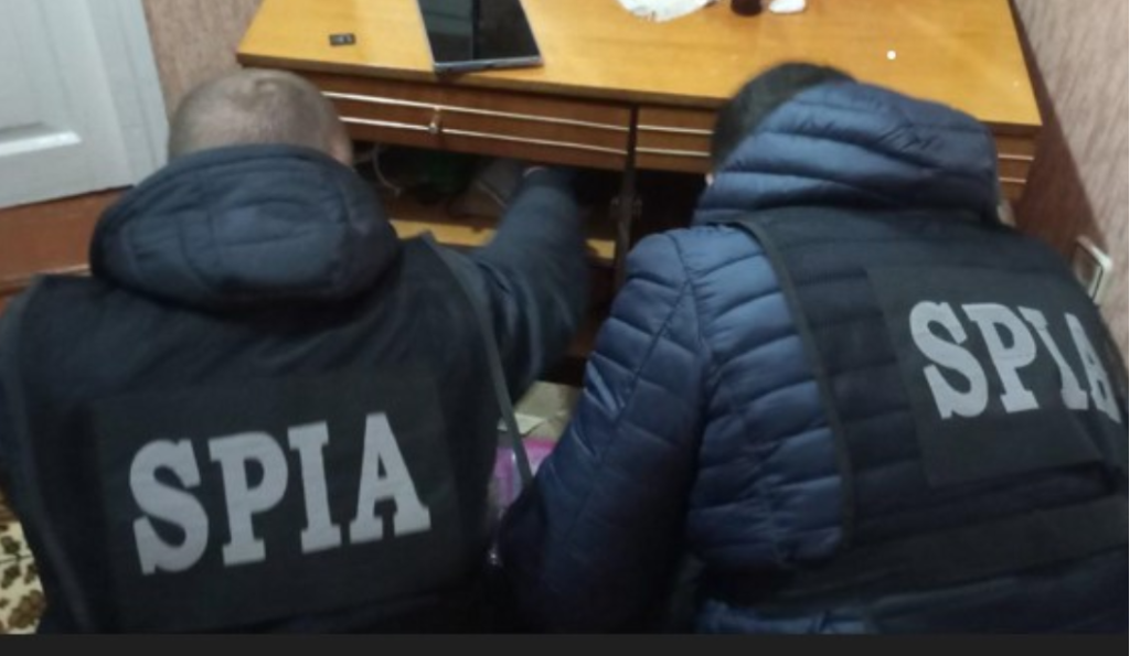 perchezitii la un grup criminal organizat