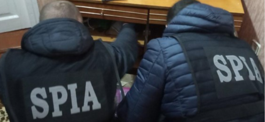 perchezitii la un grup criminal organizat