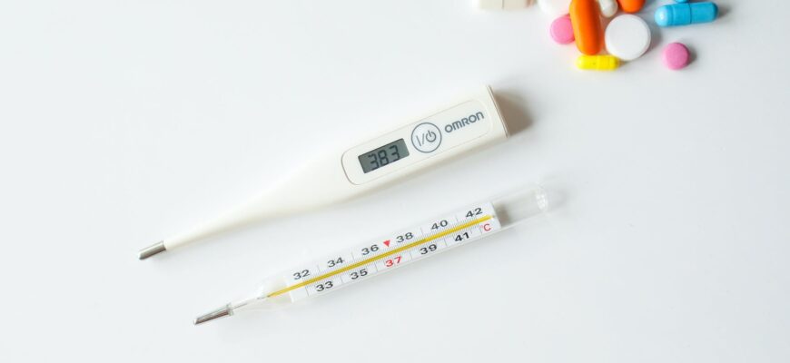 thermometers on white surface