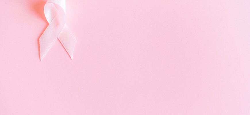 pink ribbon on pink surface