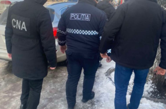 un politist a fost retinut cu mita