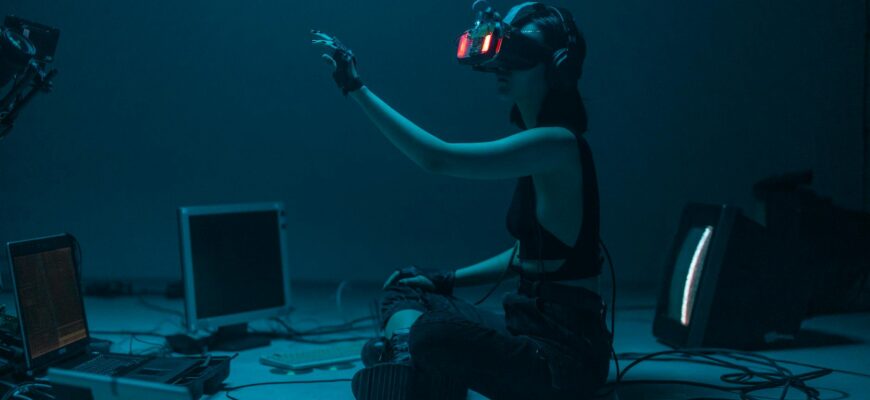 a woman in a tank top using a vr headset