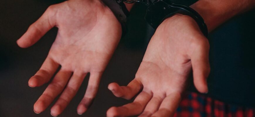 a person in handcuffs