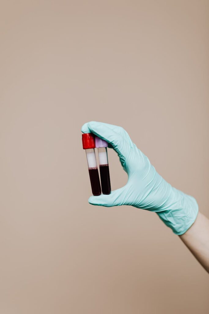 photo of person using latext gloves