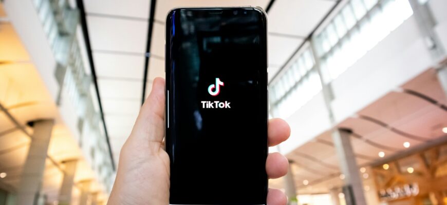 person holding black android smartphone