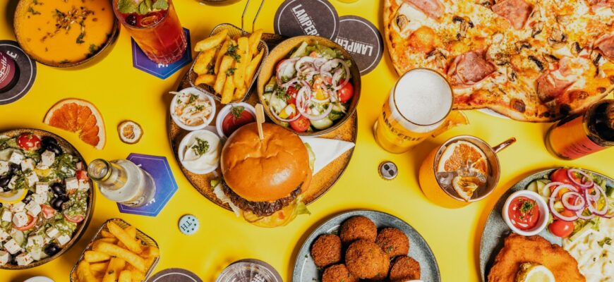 a table topped with lots of food and drinks