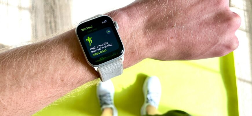 silver aluminum case apple watch with white sport band