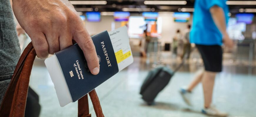 a hand holding a book