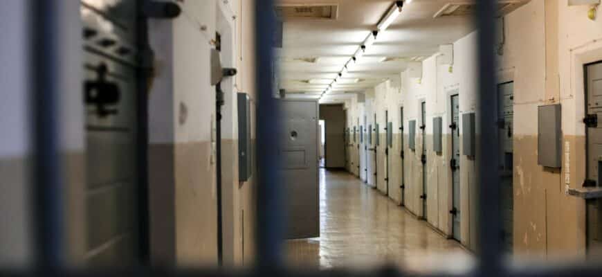 a long hallway with a bunch of lockers in it
