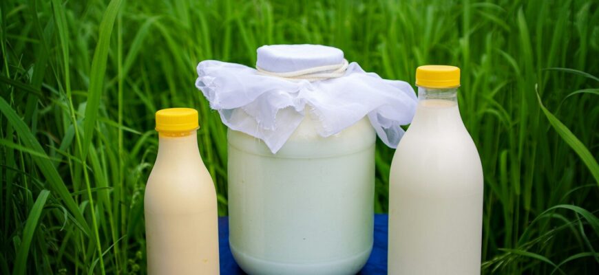 a bottle of milk, a bottle of milk and a bottle of milk on a